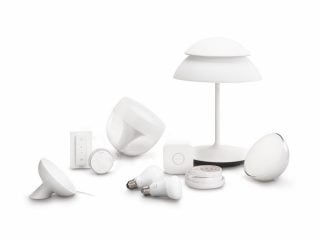 "Colección de iluminación LED inteligente Philips Hue con lámparas de mesa, bombillas y dispositivos de control para una iluminación y un ambiente personalizables del hogar".